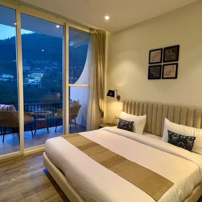 “Luxury Cottages in the Himalayas with snow mountain view”